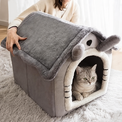 HomePaw All-Season Indoor Cat House - cat sleeping comfortably inside cosy cat house